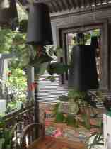Upside down pots greet customers at Brookfield Garden Centre in Qld.